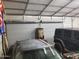 View of a garage with storage space for cars and tools at 44311 N 1St Dr, New River, AZ 85087