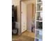 Hallway featuring a tall storage cabinet with drawers and decor at 44311 N 1St Dr, New River, AZ 85087