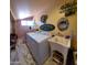 Bright laundry room with washer, dryer, and utility sink at 44311 N 1St Dr, New River, AZ 85087