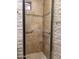 Shower with tiled walls and a glass door at 44311 N 1St Dr, New River, AZ 85087