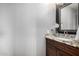 Bathroom boasts granite vanity and updated fixtures at 4849 E Abraham Ln, Phoenix, AZ 85054