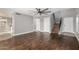 Living room with hardwood floors and staircase to upper level at 4849 E Abraham Ln, Phoenix, AZ 85054