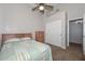 Cozy bedroom featuring a comfy bed, and a sliding closet door for additional storage at 5184 W Del Rio St, Chandler, AZ 85226