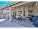 Inviting covered patio with a dining area, perfect for outdoor entertaining at 5184 W Del Rio St, Chandler, AZ 85226