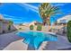 Backyard pool with clear blue water with a storage shed, and tropical trees at 5184 W Del Rio St, Chandler, AZ 85226