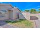 Well-maintained storage shed with adjacent grassy area in the backyard at 5184 W Del Rio St, Chandler, AZ 85226