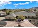 Single-story home with a brick driveway and mountain views at 5213 W Soft Wind Dr, Glendale, AZ 85310