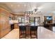 Spacious kitchen with island, stainless steel appliances, and granite countertops at 5213 W Soft Wind Dr, Glendale, AZ 85310