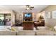 Relaxing living room with a stone fireplace and hardwood floors at 5213 W Soft Wind Dr, Glendale, AZ 85310