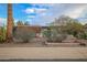 Ranch style home with landscaped front yard and driveway at 5720 E Cicero St, Mesa, AZ 85205