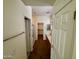 View of the hallway bathroom with shower and access to the Primary bedroom at 5829 E Nora St, Mesa, AZ 85215