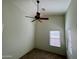 Well lit bedroom with ceiling fan and window coverings at 5829 E Nora St, Mesa, AZ 85215