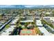 Aerial view of community, pool, tennis court, and surrounding area at 5877 N Granite Reef Rd # 1160, Scottsdale, AZ 85250