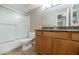 Bathroom with granite countertop, shower/tub combo at 5877 N Granite Reef Rd # 1160, Scottsdale, AZ 85250