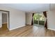 Bedroom with sliding door to patio and wood-look floors at 5877 N Granite Reef Rd # 1160, Scottsdale, AZ 85250