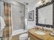 Bathroom with tub, shower, and updated vanity at 6000 E Camelback Rd # 7707, Scottsdale, AZ 85251