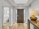 Light and bright entryway with hardwood floors at 6000 E Camelback Rd # 7707, Scottsdale, AZ 85251