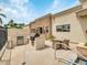 Outdoor kitchen with grill and seating area at 6000 E Camelback Rd # 7707, Scottsdale, AZ 85251