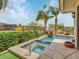 Private pool and spa with a tranquil atmosphere and lush landscaping at 6000 E Camelback Rd # 7707, Scottsdale, AZ 85251