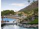 Luxury resort-style pool with private cabanas and mountain views at 6000 E Camelback Rd # 7707, Scottsdale, AZ 85251