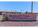 Dreamland Villa is a 55+ community with well-maintained landscaping at 6058 E El Paso St, Mesa, AZ 85205