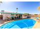 Stunning backyard pool, a covered patio, and lounge chairs creating the perfect outdoor oasis at 6058 E El Paso St, Mesa, AZ 85205