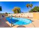 Relaxing backyard pool surrounded by lush landscaping and hardscape at 6058 E El Paso St, Mesa, AZ 85205