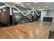 Indoor basketball court with pool view at 7117 E Rancho Vista Dr # 3010, Scottsdale, AZ 85251