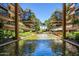 Lush courtyard with a reflecting pool and seating at 7117 E Rancho Vista Dr # 3010, Scottsdale, AZ 85251