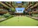 Putting green surrounded by lush landscaping at 7117 E Rancho Vista Dr # 3010, Scottsdale, AZ 85251