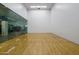 Spacious racquetball court with hardwood floors and glass walls at 7117 E Rancho Vista Dr # 3010, Scottsdale, AZ 85251