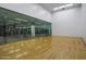 Racquetball court with glass wall overlooking fitness center at 7117 E Rancho Vista Dr # 3010, Scottsdale, AZ 85251