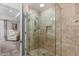 Modern shower with glass enclosure and neutral-toned tile at 7117 E Rancho Vista Dr # 3010, Scottsdale, AZ 85251