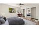 Main bedroom with mirrored closet and wood-like floors at 7663 E Coolidge St, Scottsdale, AZ 85251