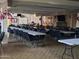 Large community room with tables and chairs for events at 8103 E Southern Ave # 84, Mesa, AZ 85209