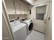 Convenient laundry room with washer, dryer, and storage at 8103 E Southern Ave # 84, Mesa, AZ 85209