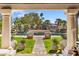 Picturesque backyard vista with a beautiful pool, inviting lounge chairs, and lush landscaping at 8119 E Foothills Dr, Scottsdale, AZ 85255