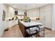 Stylish kitchen featuring a large center island, modern appliances, and custom cabinetry at 8119 E Foothills Dr, Scottsdale, AZ 85255