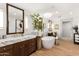 Luxurious main bathroom with marble countertops, free-standing tub, and stylish fixtures at 8119 E Foothills Dr, Scottsdale, AZ 85255