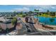 Aerial view of Fountain of the Sun community, featuring roads, landscaping, and a lake at 814 S 78Th St, Mesa, AZ 85208