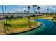 Golf course with water feature and palm trees at 814 S 78Th St, Mesa, AZ 85208