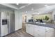 Bright kitchen with stainless steel refrigerator and granite countertops at 814 S 78Th St, Mesa, AZ 85208