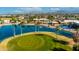 Lakefront view of Fountain of the Sun with palm trees and a fountain at 814 S 78Th St, Mesa, AZ 85208