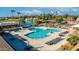 Resort-style pool area with lounge chairs, tables, and a hot tub at 814 S 78Th St, Mesa, AZ 85208