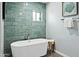 This bathroom features a modern tub, window, and stylish finishes at 8312 E Mackenzie Dr, Scottsdale, AZ 85251