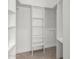 Large walk-in closet with ample shelving and hanging space at 8773 W Pineveta Dr, Arizona City, AZ 85123