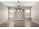 Spacious dining room with recessed lighting and tile floors at 8773 W Pineveta Dr, Arizona City, AZ 85123