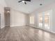 Bright and airy living room with French doors leading to the backyard at 8773 W Pineveta Dr, Arizona City, AZ 85123