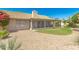 Home exterior showcasing backyard and screened patio at 9555 W Escuda Dr, Peoria, AZ 85382