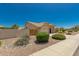 Well-maintained house with attractive landscaping and a two-car garage at 9555 W Escuda Dr, Peoria, AZ 85382